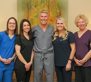 Doctor Hermen and his dental team
