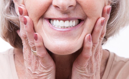 A woman smiling