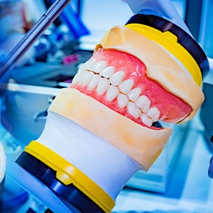 Dentures can be made of a variety of materials including acrylic and nylon