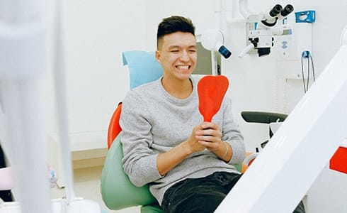 Man at BlueCross BlueShield dentist in Oklahoma City. 