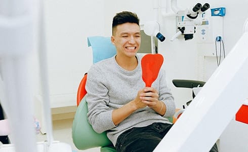 Man at BlueCross BlueShield dentist in Oklahoma City. 
