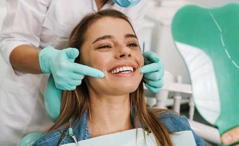 patient smiling after gum recontouring