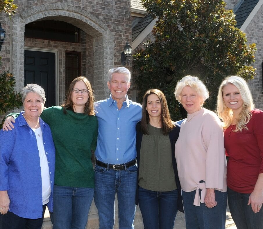 Doctor Hermen and his dental team outside of Oklahoma City dental office