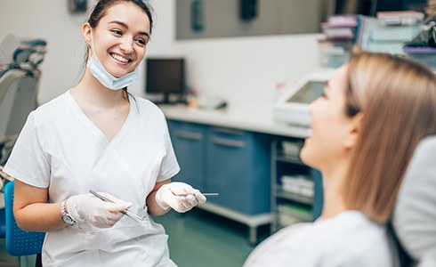 Cosmetic dentist in Oklahoma City speaking with a patient