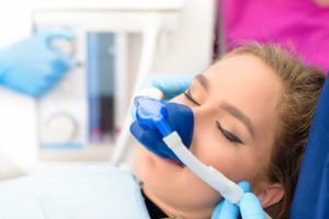 a woman at ease with getting nitrous oxide at the dentist